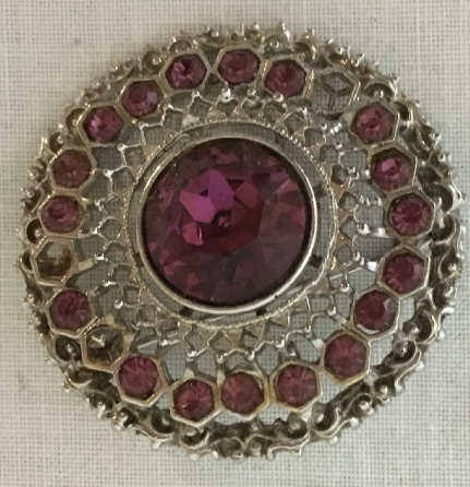 Broach old